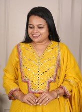 Yellow anarkali mulcotton dress with mirrorwork detaling on neck