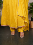 Yellow anarkali mulcotton dress with mirrorwork detaling on neck