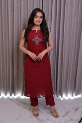 Red Solid Sleeveless Kurti with Embroidered Yoke & Straight Pants – 2 Piece Set