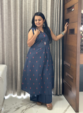 Blue jamdani cotton sleeveless kurti set with subtle hand detailing with attached sleeves