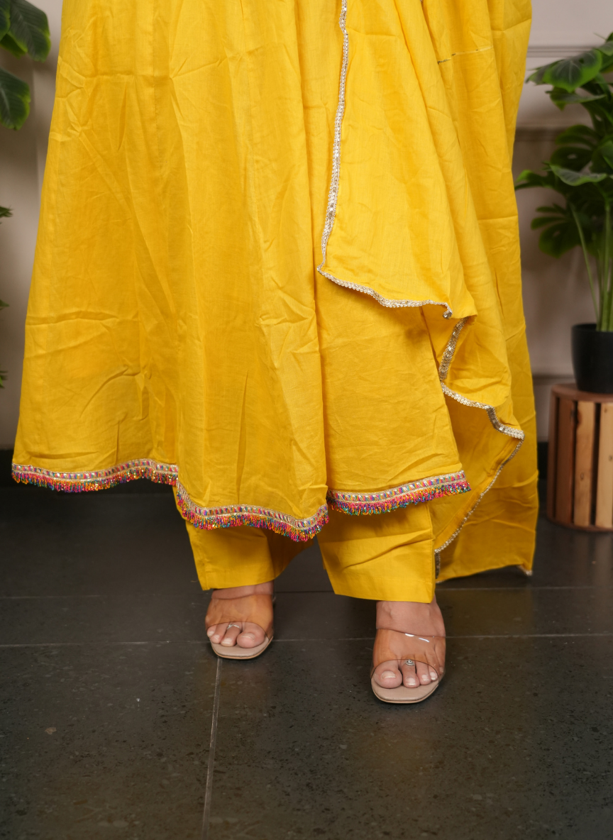 Yellow anarkali mulcotton dress with mirrorwork detaling on neck
