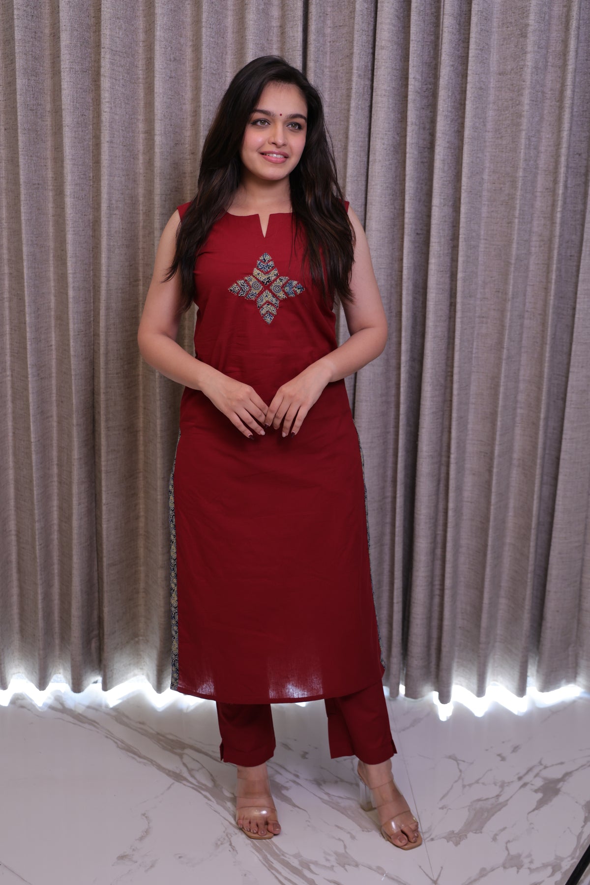Red Solid Sleeveless Kurti with Embroidered Yoke & Straight Pants – 2 Piece Set
