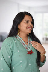Green jamdani cotton kurti set with handcrafted detailing on neck